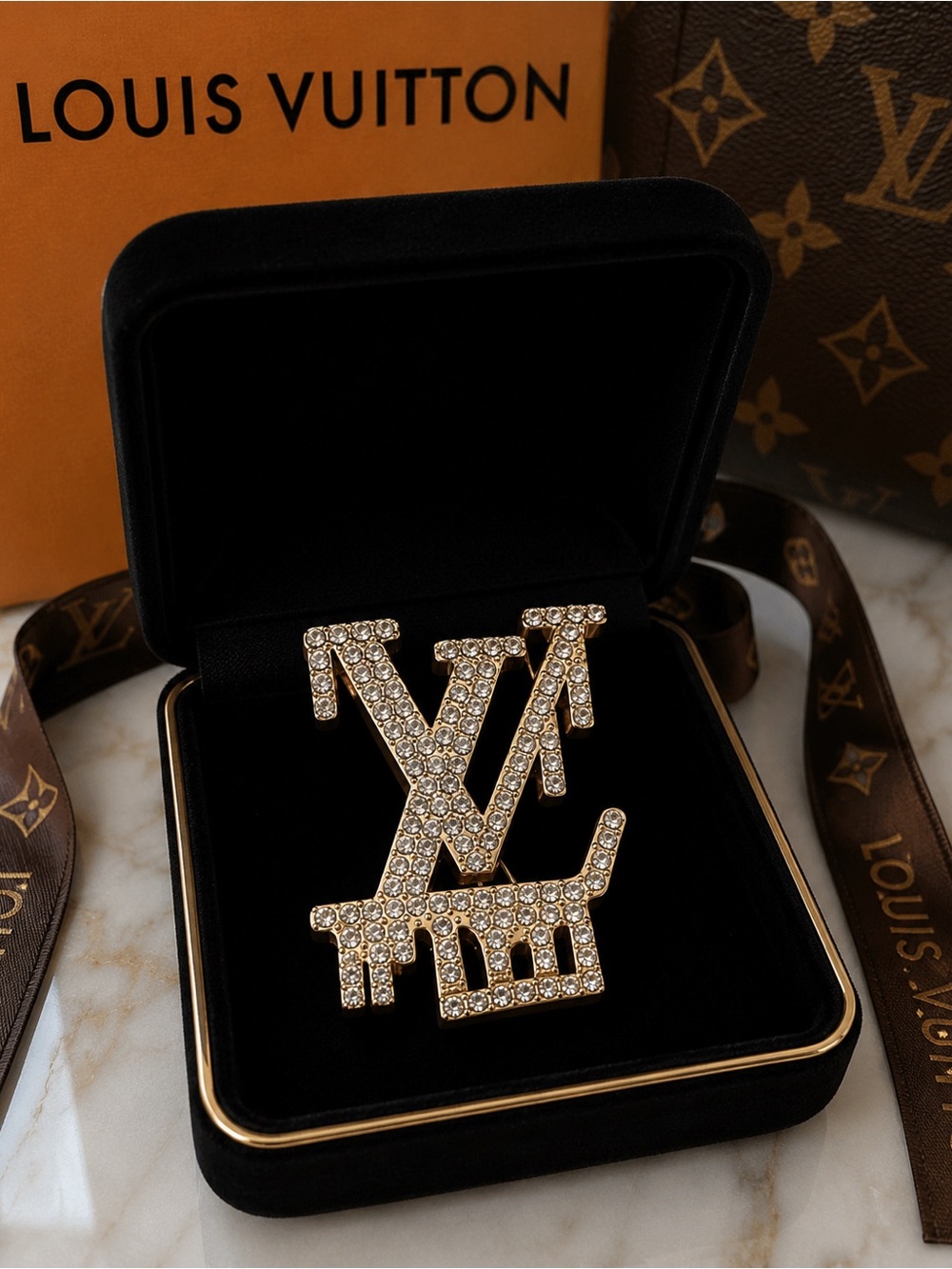 Gold tone Crystal stamped LV Brooch